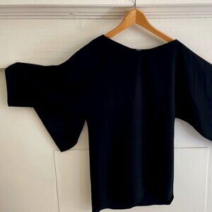 Perfect for the holiday party. 
ELIE TAHARI SHORT BLACK DRESS